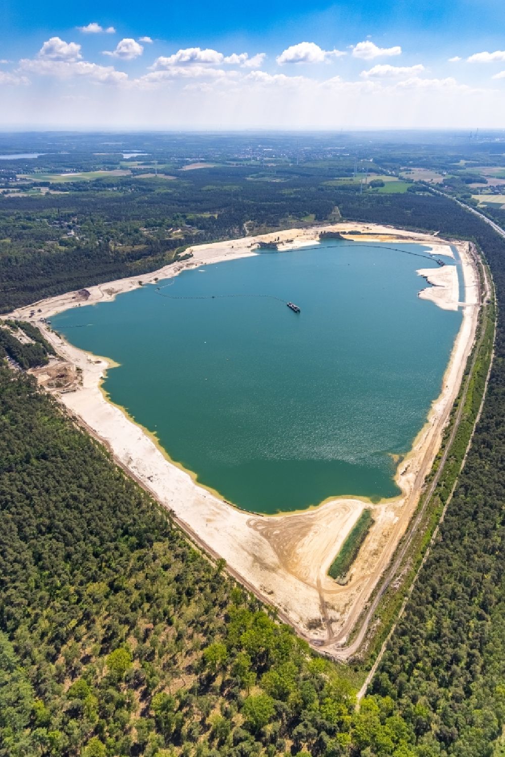 Aerial photograph Haltern am See - Aerial view of the Silver Lake with quartz sand extraction in a forest area in the district of Lehmbraken in Haltern am See in the Ruhr area in North Rhine-Westphalia, Germany