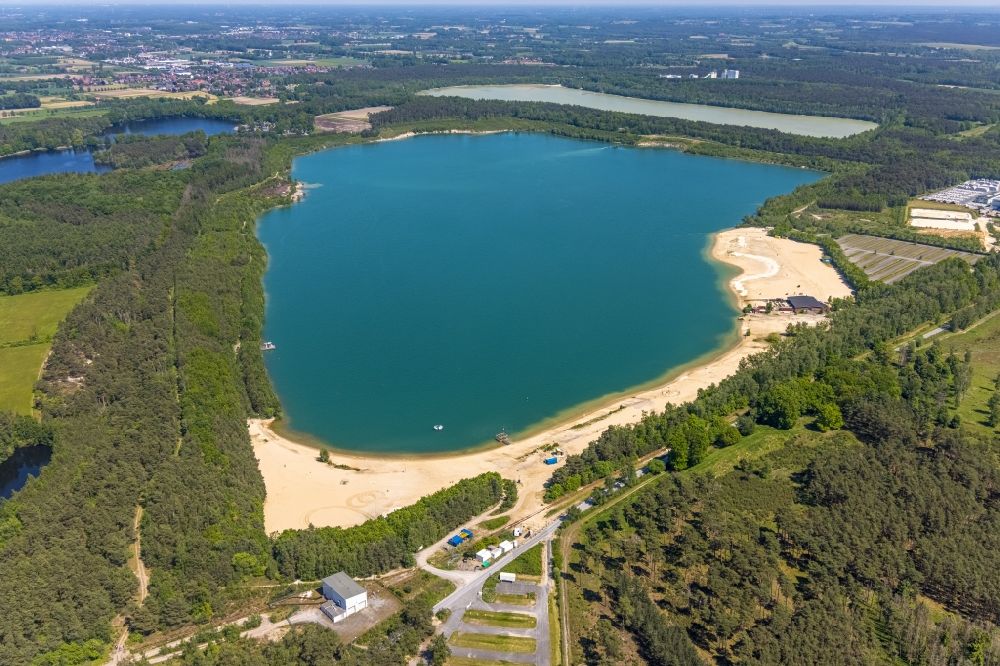 Aerial image Haltern am See - Aerial view of the Silver Lake with quartz sand extraction in a forest area in the district of Lehmbraken in Haltern am See in the Ruhr area in North Rhine-Westphalia, Germany