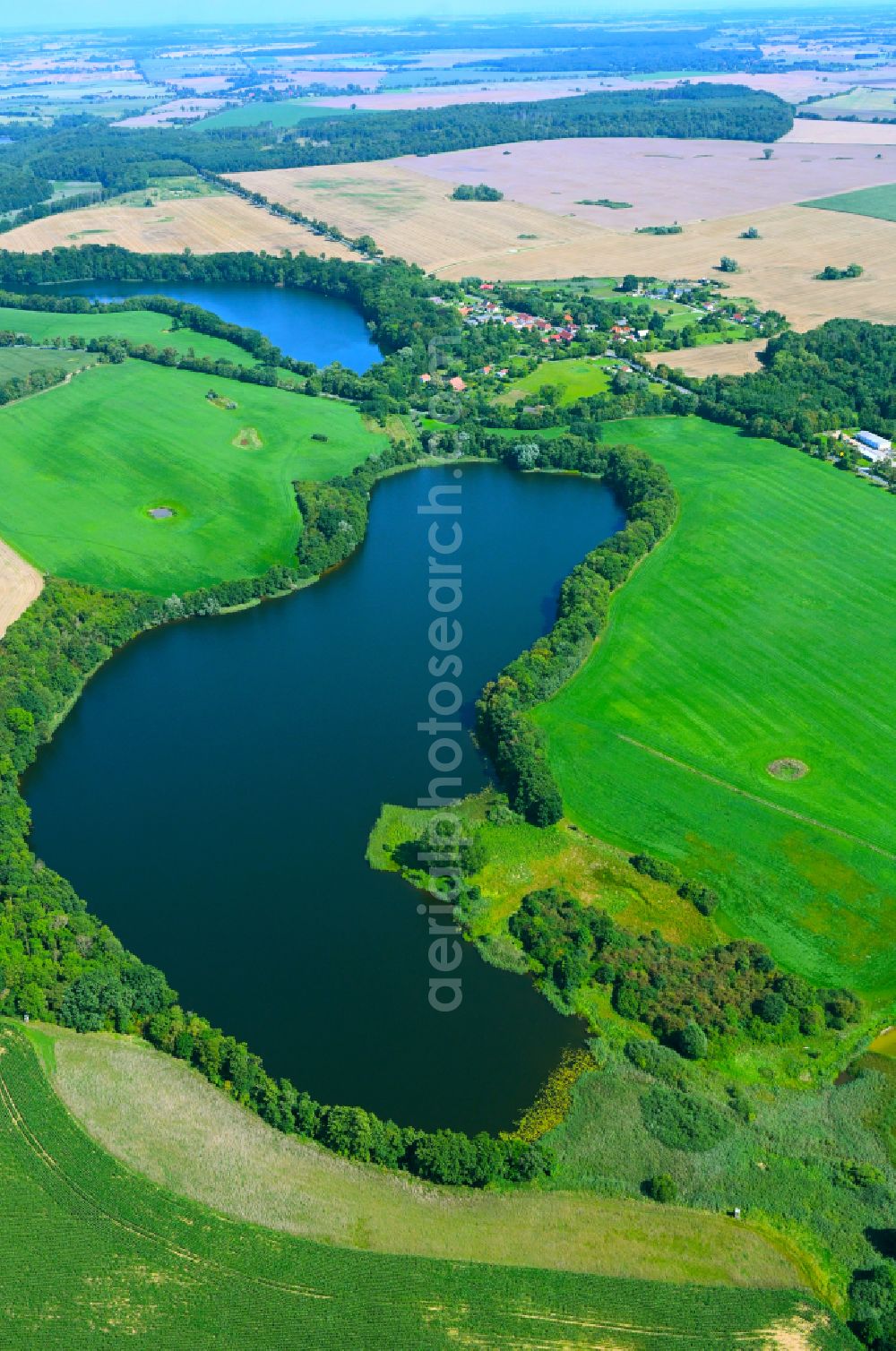 Möllenbeck from the bird's eye view: Riparian areas on the lake area of Tiefer See in Moellenbeck in the state Mecklenburg - Western Pomerania, Germany