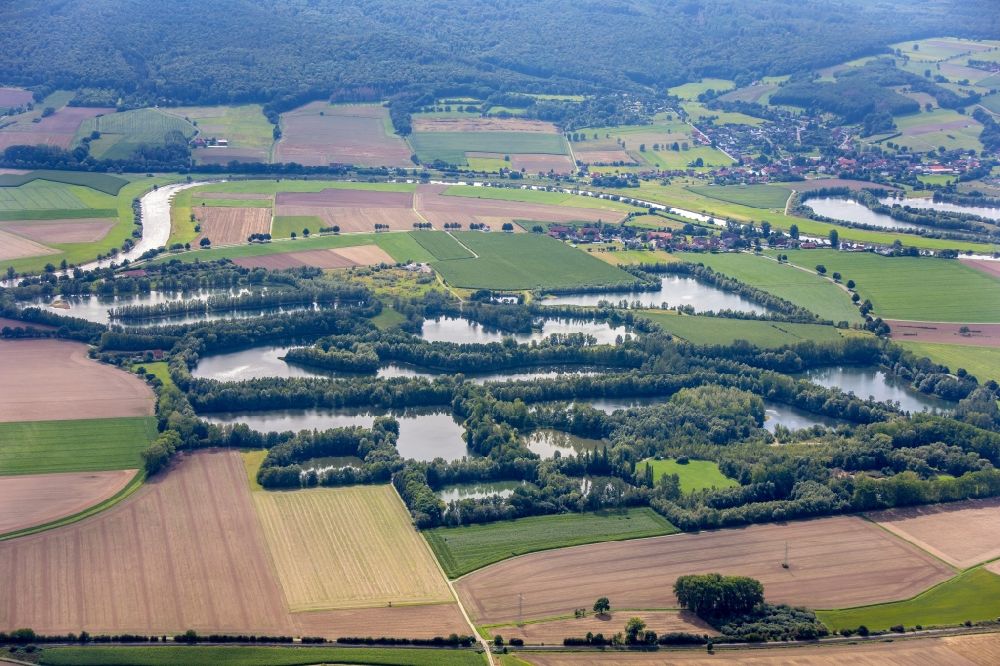 Rinteln from above - Shore areas of the ponds for fish farming Grosswieden in Rinteln in the state Lower Saxony, Germany