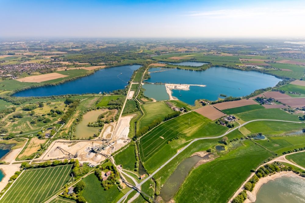 Rees from above - Shore areas of the ponds for fish farming Reeser Meer in Rees in the state North Rhine-Westphalia, Germany