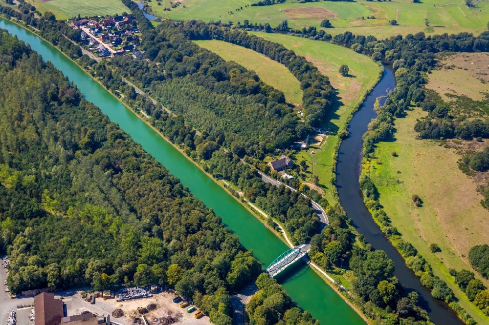 Hünxe from above - Curved loop of the riparian zones on the course of the river Wesel-Datteln-Kanal and Lippe in Huenxe in the state North Rhine-Westphalia, Germany