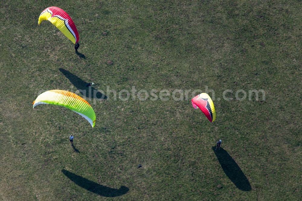 Aerial photograph Unterhaching - Ultralight aircraft in flight above the sky above the old runway in the Hachinger Tal landscape park in the district Unterbiberg in Unterhaching in the state Bavaria, Germany