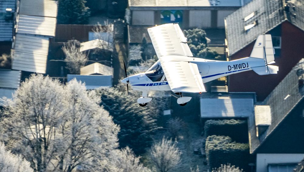 Aerial image Hamm - Ultralight aircraft C42 with the identifier D-MWDJ in flight above the sky in the district Heessen in Hamm at Ruhrgebiet in the state North Rhine-Westphalia, Germany