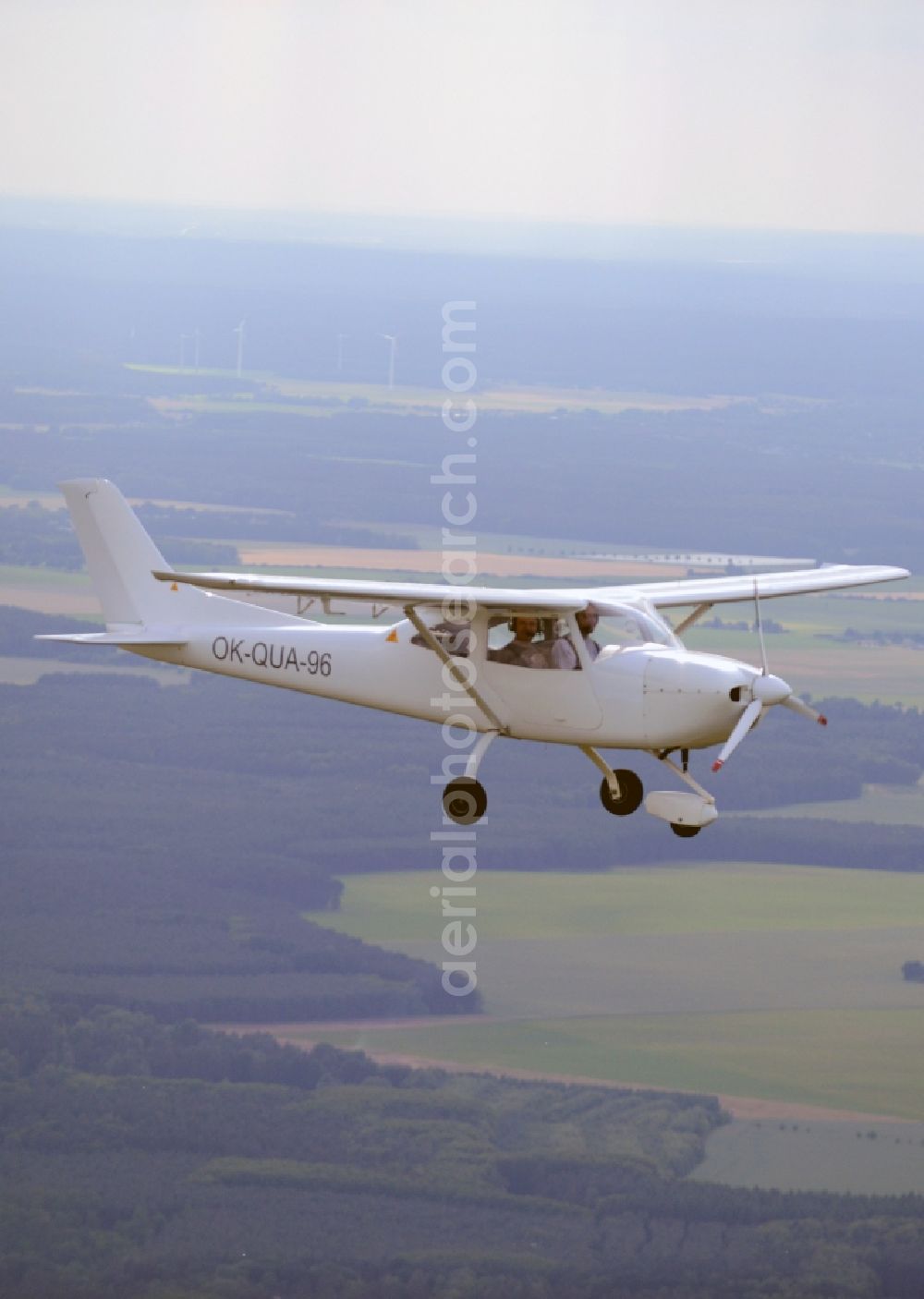 Aerial image Leuenberg - Ultralight aircraft Skylane in flight above the sky in Leuenberg in the state Brandenburg, Germany