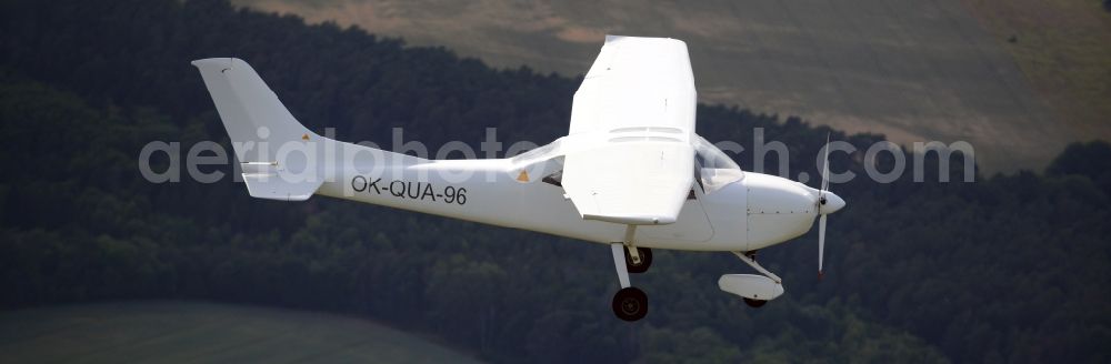 Aerial image Leuenberg - Ultralight aircraft Skylane in flight above the sky in Leuenberg in the state Brandenburg, Germany