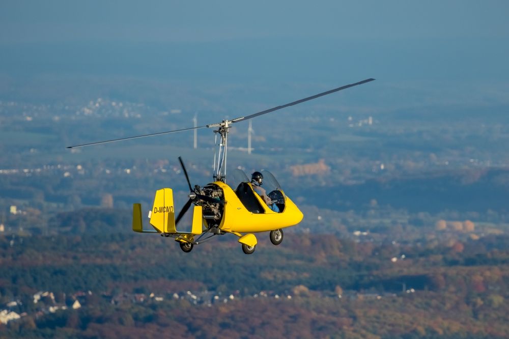 Aerial image Witten - Yellow ultralight aircraft gyrocopter callsign D-MCMD in flight over the airspace in the district Voeckenberg in Witten in the state North Rhine-Westphalia