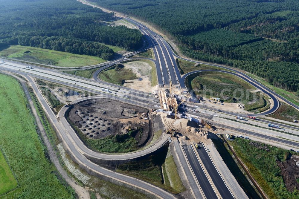 Wöbbelin from the bird's eye view: Expansion and construction site of the highway triangle Schwerin on the motorway BAB A14 and A24 at Wöbbelin in Mecklenburg - Western Pomerania