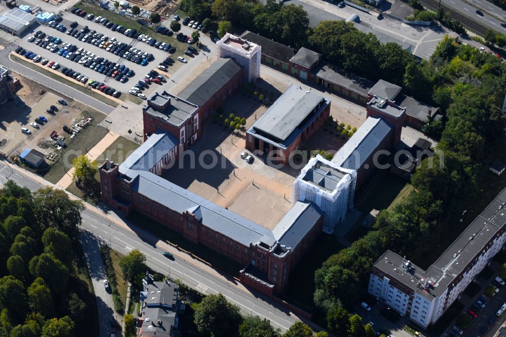 Aerial photograph Schwerin - Construction site for reconstruction and modernization and renovation of an office and commercial building of Finanzamt Schwerin on Johannes-Stelling-Strasse in Schwerin in the state Mecklenburg - Western Pomerania, Germany