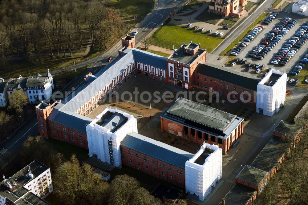 Aerial photograph Schwerin - Construction site for reconstruction and modernization and renovation of an office and commercial building of Finanzamt Schwerin on Johannes-Stelling-Strasse in Schwerin in the state Mecklenburg - Western Pomerania, Germany