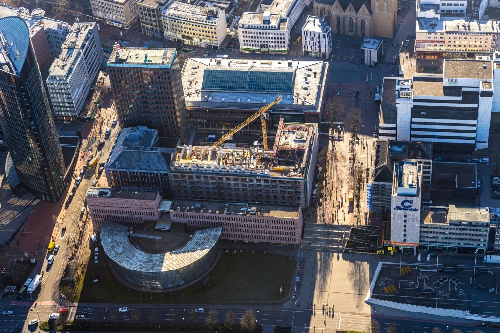 Dortmund from the bird's eye view: Construction site for reconstruction and modernization and renovation of an office and commercial building Dortberghau on Koenigswall - Max-Von-Der-Gruen-Platz in the district City-West in Dortmund in the state North Rhine-Westphalia, Germany