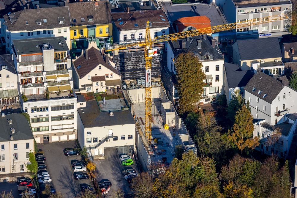 Aerial photograph Arnsberg - Construction site for reconstruction and modernization and renovation of an office and commercial building on Hauptstrasse in the district Neheim in Arnsberg in the state North Rhine-Westphalia, Germany