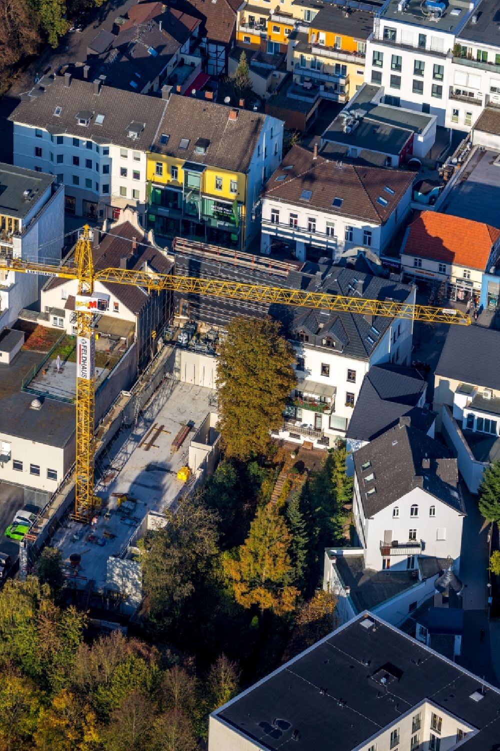 Arnsberg from above - Construction site for reconstruction and modernization and renovation of an office and commercial building on Hauptstrasse in the district Neheim in Arnsberg in the state North Rhine-Westphalia, Germany