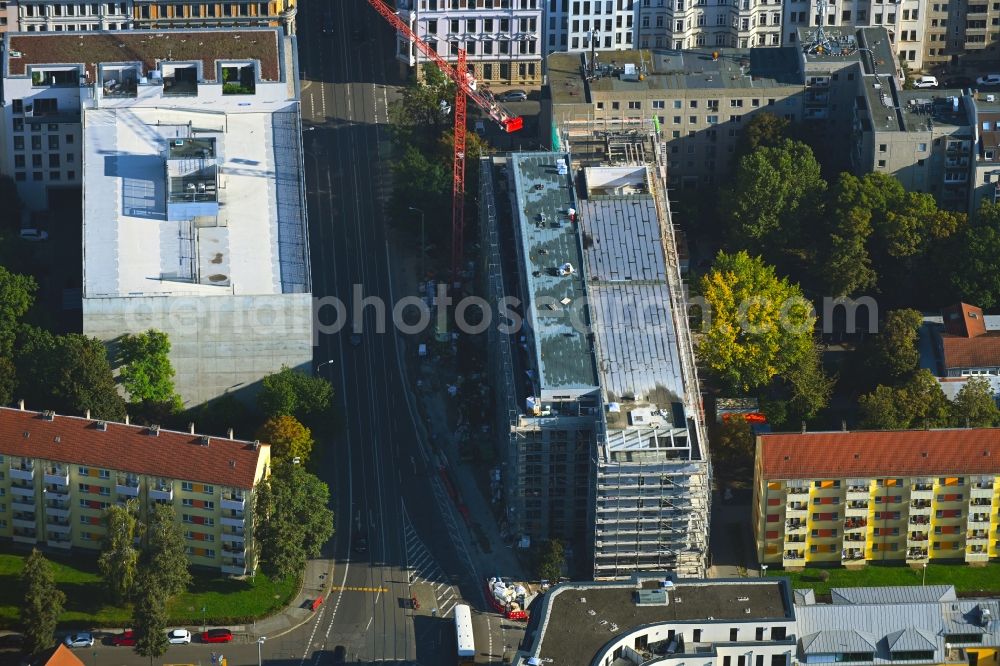 Leipzig from the bird's eye view: Construction site for reconstruction and modernization and renovation of an office and commercial building on Kaethe-Kollwitz-Strasse in Leipzig in the state Saxony, Germany