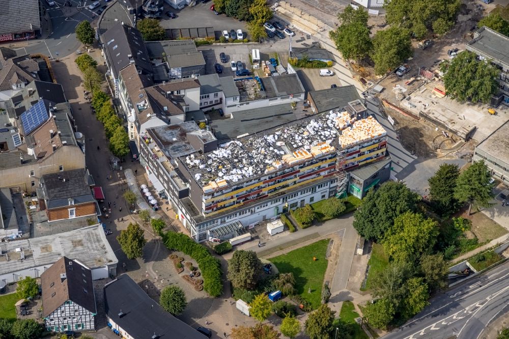 Gevelsberg from the bird's eye view: Construction site for reconstruction and modernization and renovation of an office and commercial building on Mittelstrasse - Grosser Markt in Gevelsberg in the state North Rhine-Westphalia, Germany