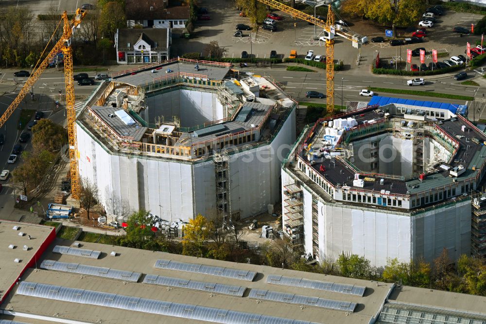 Aerial image Unterföhring - Construction site for reconstruction and modernization and renovation of an office and commercial building Oktavian-Tuerme on street Muenchner Strasse in the district Unterfoehring in Unterfoehring in the state Bavaria, Germany
