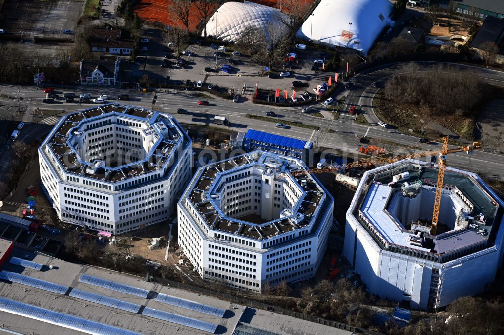 Unterföhring from above - Construction site for reconstruction and modernization and renovation of an office and commercial building Oktavian-Tuerme on street Muenchner Strasse in the district Unterfoehring in Unterfoehring in the state Bavaria, Germany