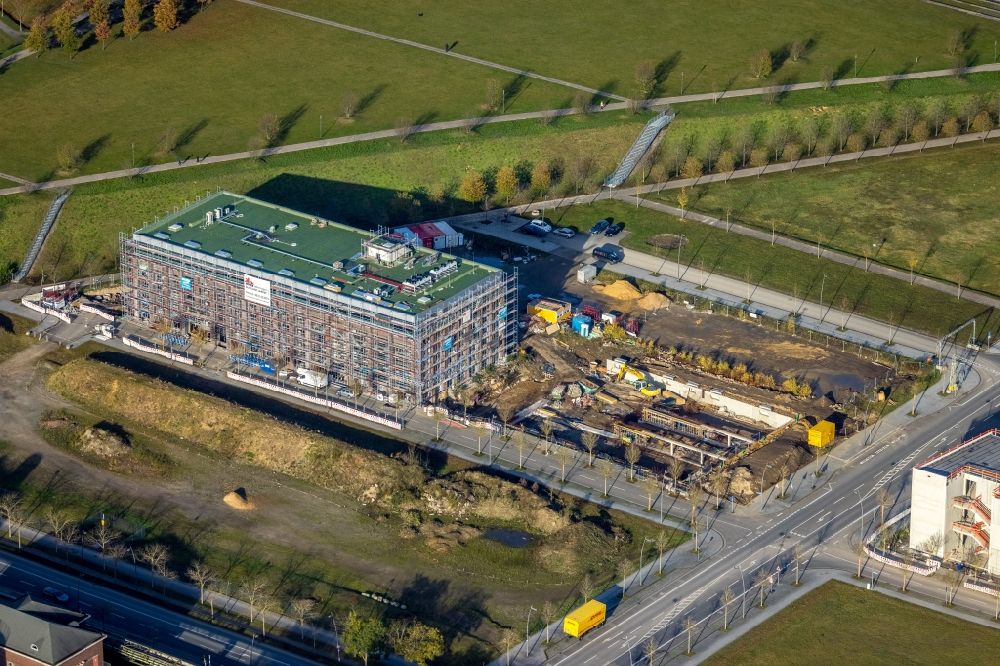 Dortmund from the bird's eye view: Construction site for reconstruction and modernization and renovation of an office and commercial building Phoenix-Arcaden on Antonio-Segni-Strasse in the district Phoenix-West in Dortmund in the state North Rhine-Westphalia, Germany