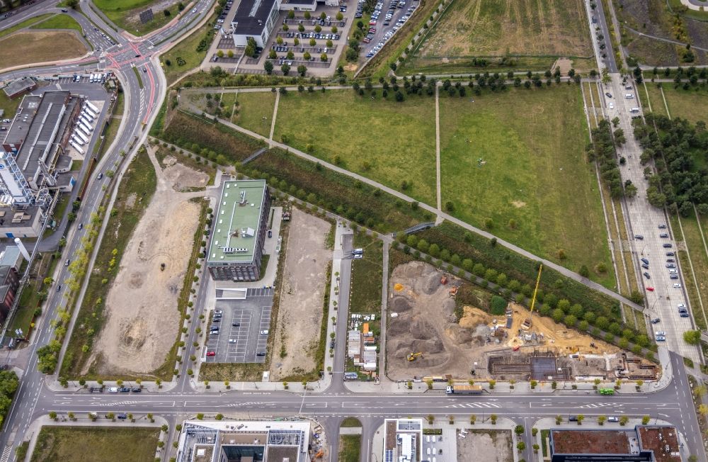 Dortmund from the bird's eye view: Construction site for reconstruction and modernization and renovation of an office and commercial building Phoenix-Arcaden on Antonio-Segni-Strasse in the district Phoenix-West in Dortmund at Ruhrgebiet in the state North Rhine-Westphalia, Germany