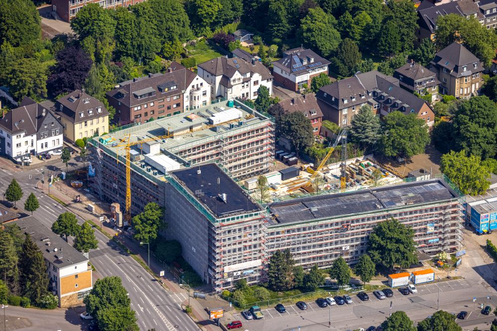 Bottrop from above - Construction site for reconstruction and modernization and renovation of an office and commercial building of RAG Gebaeudes zum Bauknecht Quartier between Boeckenhoffstrasse and Gleiwitzer Platz in Bottrop at Ruhrgebiet in the state North Rhine-Westphalia, Germany