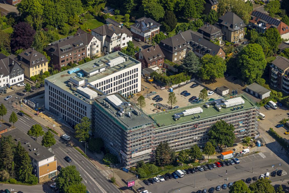 Aerial photograph Bottrop - Construction site for reconstruction and modernization and renovation of an office and commercial building of RAG Gebaeudes zum Bauknecht Quartier between Boeckenhoffstrasse and Gleiwitzer Platz in Bottrop at Ruhrgebiet in the state North Rhine-Westphalia, Germany