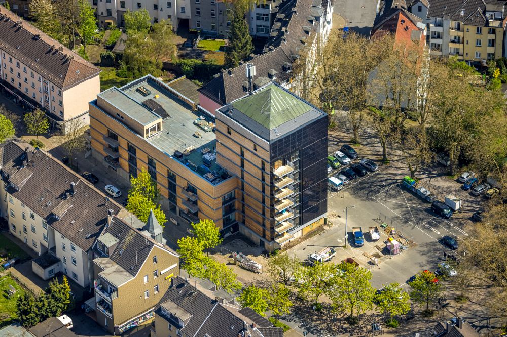 Herne from above - Construction site for the conversion and new modernization work on the bunker building complex for the residential building we-house Herne on Kurt-Edelhagen-Platz in Herne in the state North Rhine-Westphalia, Germany