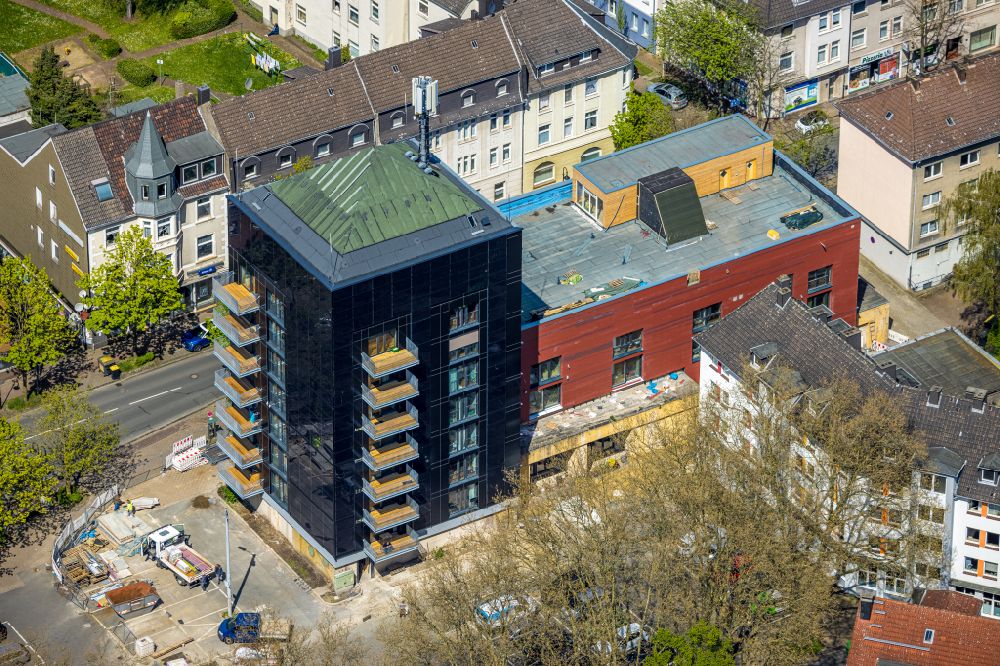 Aerial image Herne - Construction site for the conversion and new modernization work on the bunker building complex for the residential building we-house Herne on Kurt-Edelhagen-Platz in Herne in the state North Rhine-Westphalia, Germany