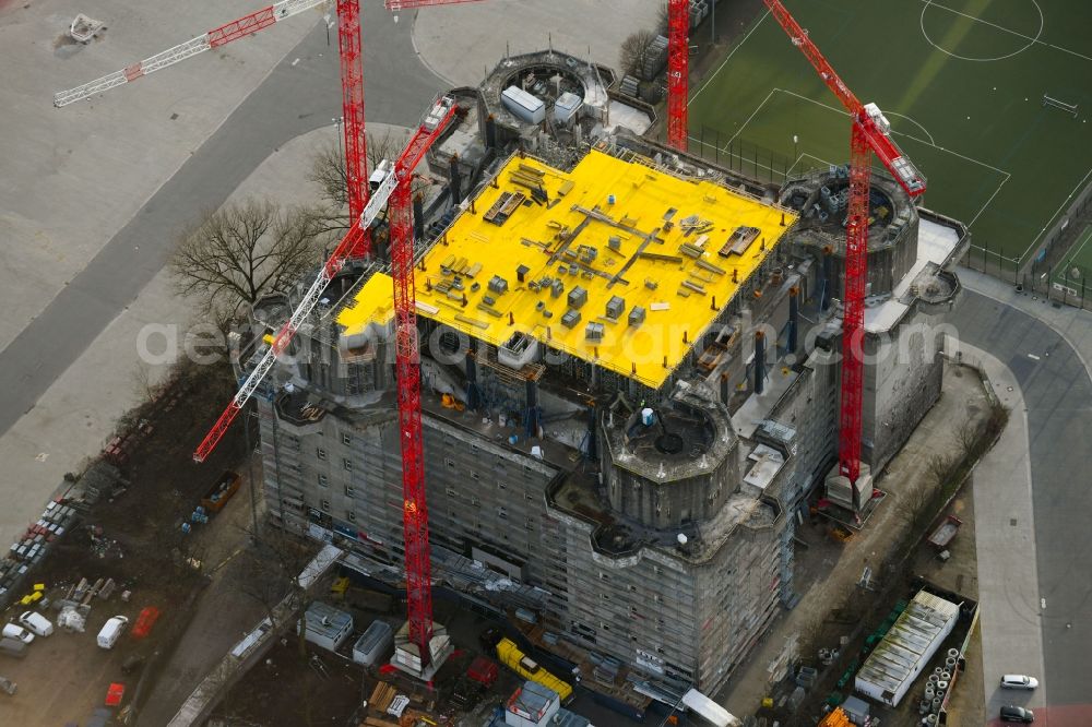 Hamburg from the bird's eye view: Construction site on Bunker building complex made of concrete and steel Medienbunker or Hamburger Flaktuerme on Feldstrasse in the district Sankt Pauli in Hamburg, Germany