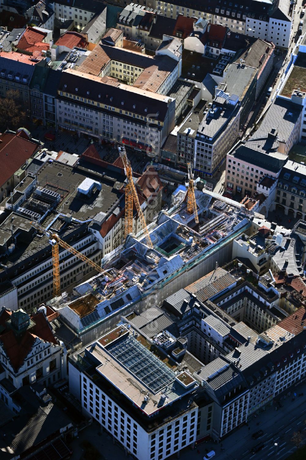 München from the bird's eye view: Construction site for reconstruction and modernization and renovation of an office and commercial building on street Neuhauser Strasse - Herzog-Max-Strasse in the district Altstadt in Munich in the state Bavaria, Germany