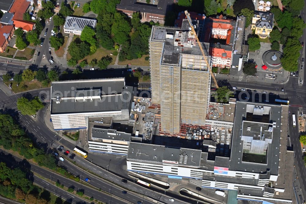 Berlin from above - Construction site for the reconstruction of the high-rise building and building complex Steglitzer Kreisel - UBERLIN residential tower on Schlossstrasse in the district of Steglitz in Berlin