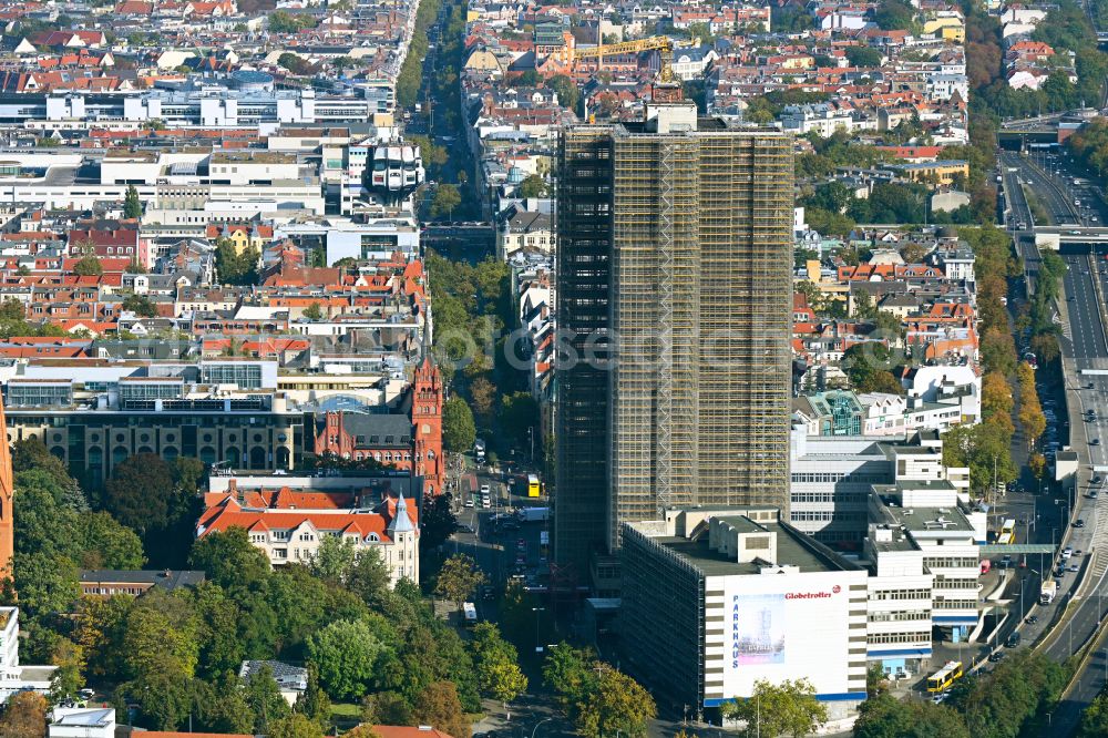 Aerial image Berlin - Construction site for the reconstruction of the high-rise building and building complex Steglitzer Kreisel - UBERLIN residential tower on Schlossstrasse in the district of Steglitz in Berlin