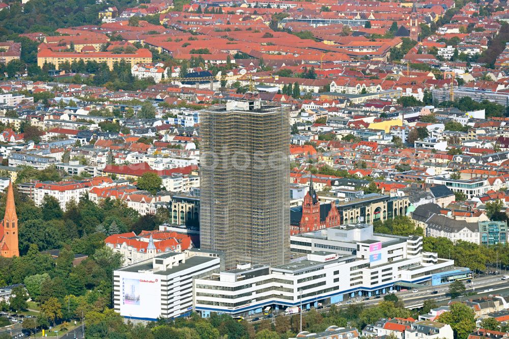 Berlin from above - Construction site for the reconstruction of the high-rise building and building complex Steglitzer Kreisel - UBERLIN residential tower on Schlossstrasse in the district of Steglitz in Berlin