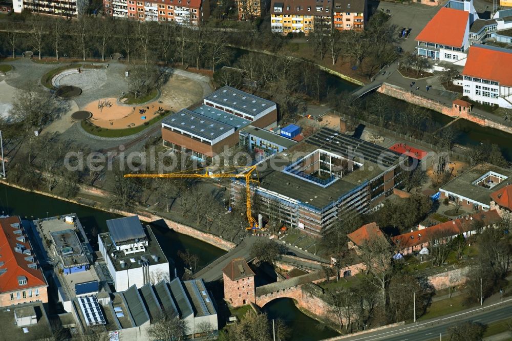 Nürnberg from the bird's eye view: Construction sites for the conversion, expansion and modernization of the school building Grundschule Insel Schuett in the district Altstadt - Sankt Lorenz in Nuremberg in the state Bavaria, Germany
