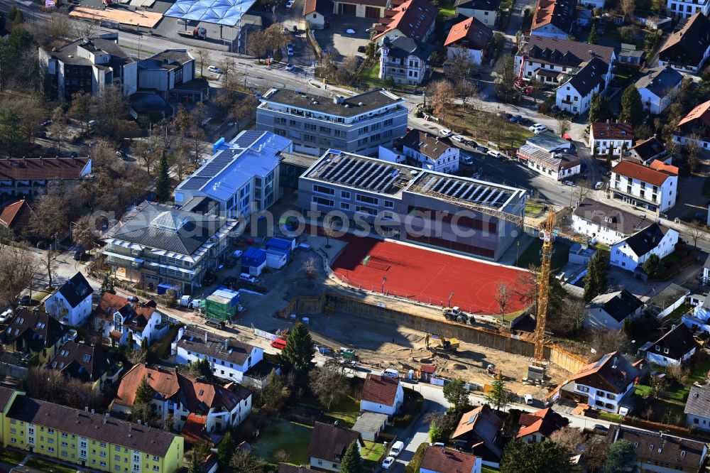 Aerial photograph Unterföhring - Construction sites for the conversion, expansion and modernization of the school building a primary school on street Bahnhofstrasse in the district Unterfoehring on street Bahnhofstrasse in Unterfoehring in the state Bavaria, Germany