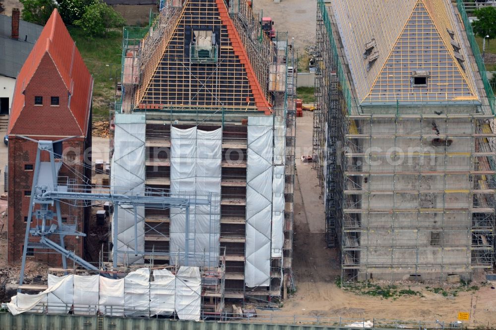 Aerial photograph Wittenberge - Reconstruction and renovation of the building of the Old Oil Mill Wittenberg in Wittenberg in the port in the state of Brandenburg