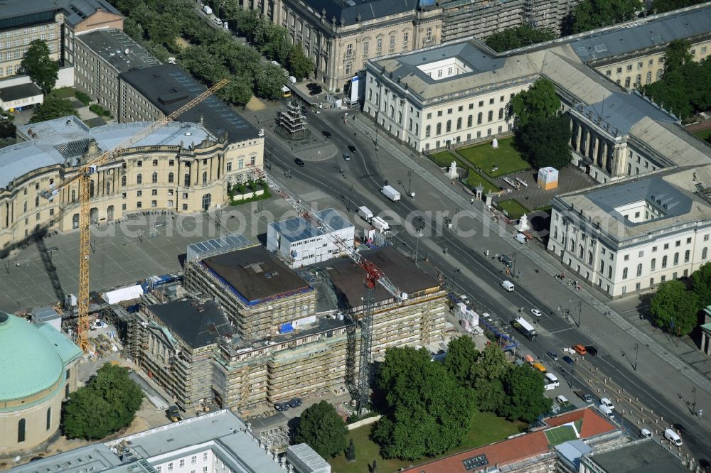 Aerial photograph Berlin - View of the reconstruction and renovation of the building of the Staatsoper Unter den Linden in Berlin at Bebelplatz. It is the oldest opera house and theater building in Berlin. A new building will serve as stacks and warehouse for the Staatsoper Komplex. The architect HG Merz is a overseeing the reconstruction of the historical building complex