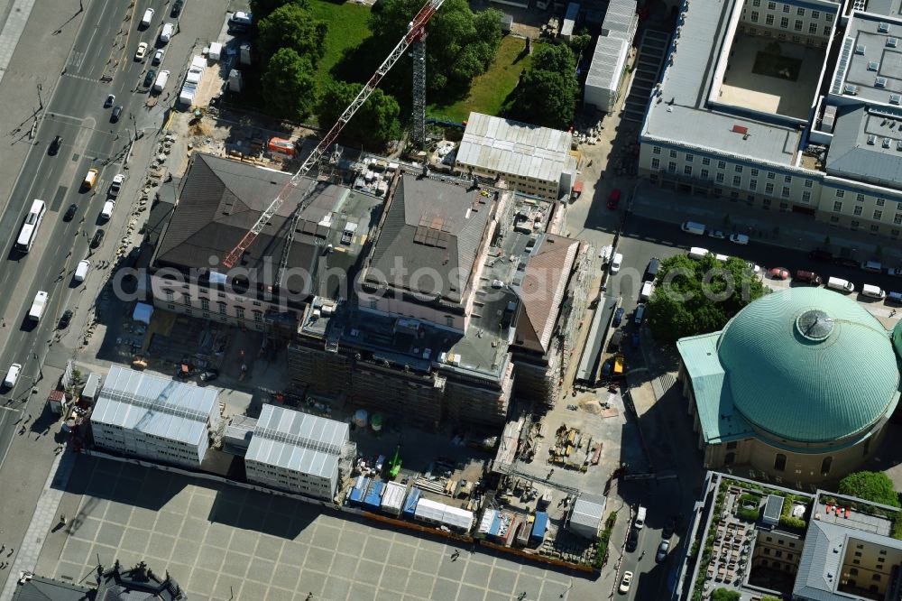 Aerial photograph Berlin - Reconstruction and renovation of the building of the Staatsoper Unter den Linden in Berlin at Bebelplatz. It is the oldest opera house and theater building in Berlin. A new building will serve as stacks and warehouse for the Staatsoper Komplex. The architect HG Merz is a overseeing the reconstruction of the historical building complex