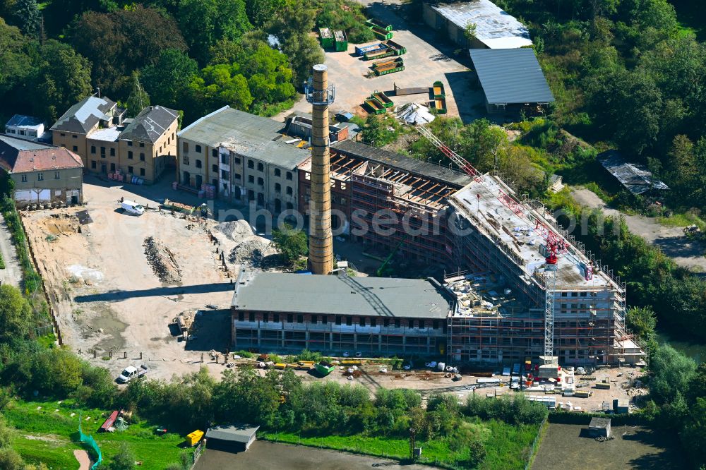 Aerial photograph Schkeuditz - Conversion construction site to modernize and renovate the factory premises of the old paper factory on Fabrikstrasse into apartments in the district of Wehlitz in Schkeuditz in the state Saxony, Germany