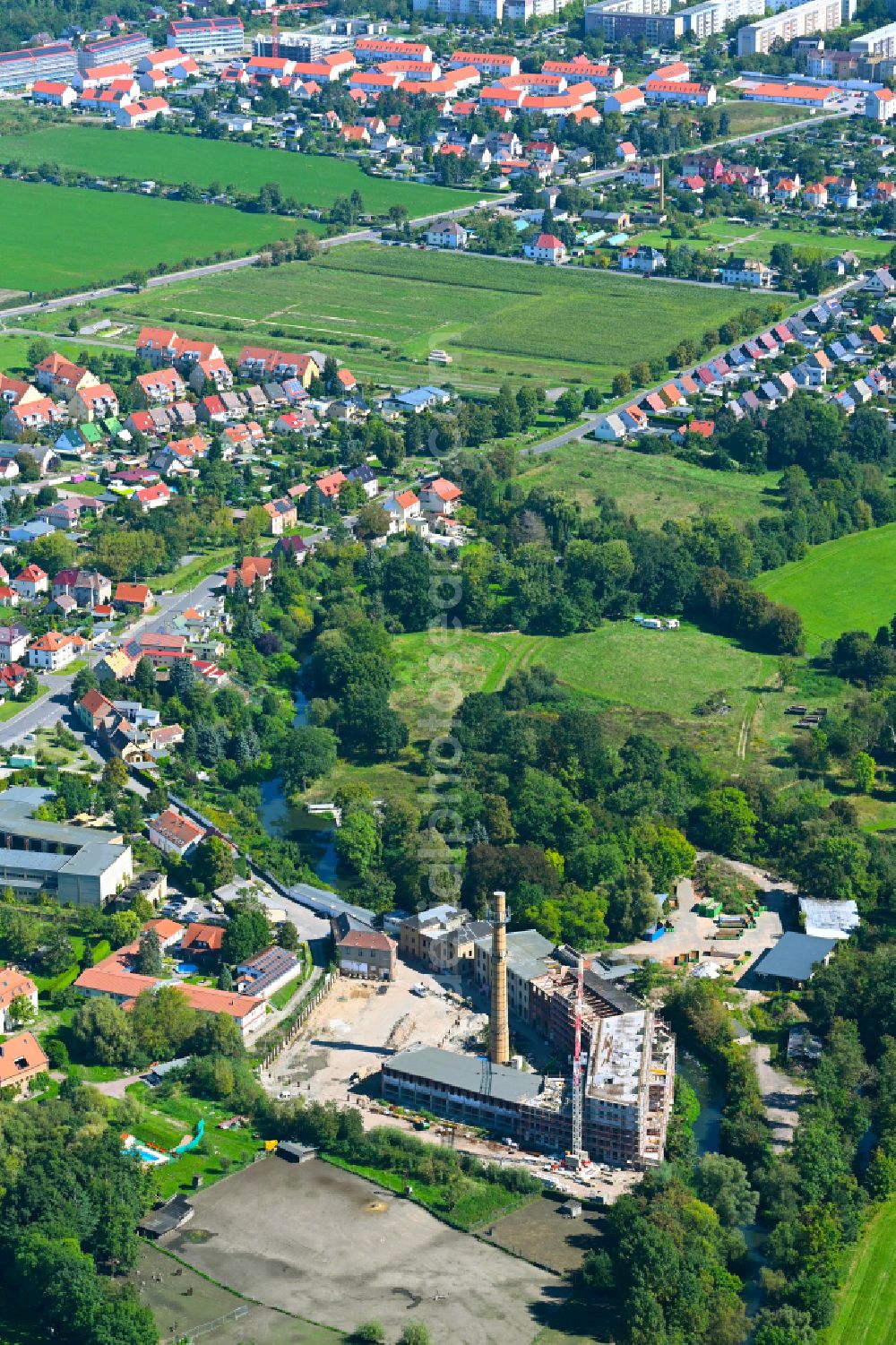 Aerial image Schkeuditz - Conversion construction site to modernize and renovate the factory premises of the old paper factory on Fabrikstrasse into apartments in the district of Wehlitz in Schkeuditz in the state Saxony, Germany