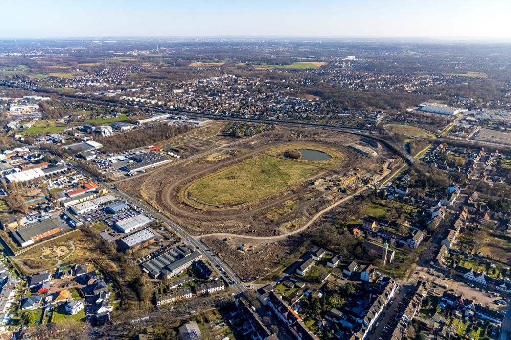 Recklinghausen from the bird's eye view: Development, demolition and renovation work on the site of the former racing track - harness racing track as part of the integrated district development concept (ISEK) Hillerheide in Recklinghausen in the state of North Rhine-Westphalia, Germany