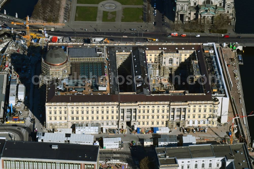 Berlin from the bird's eye view: Construction site for the new building the largest and most important cultural construction of the Federal Republic, the building of the Humboldt Forum in the form of the Berlin Palace