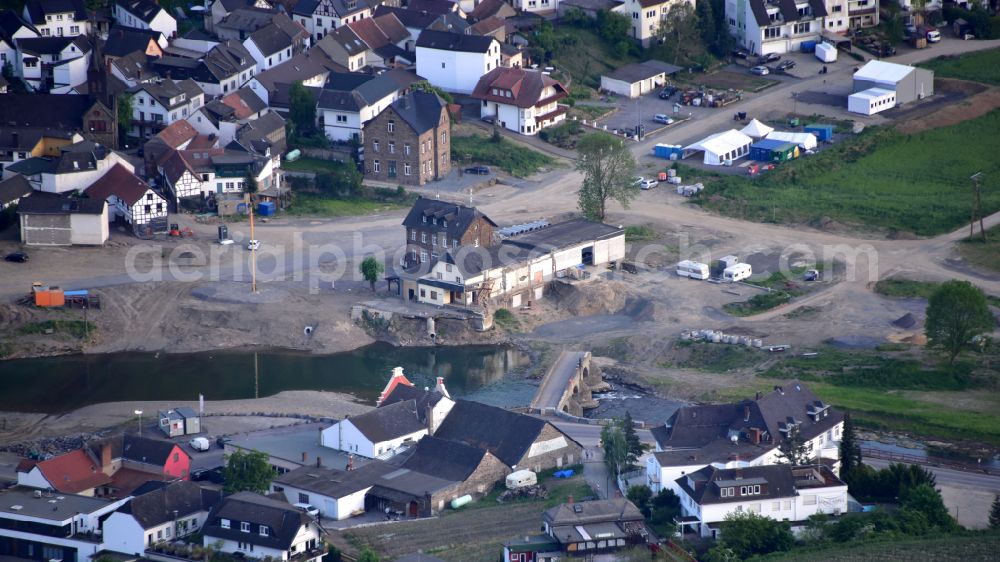 Aerial photograph Rech - Destruction landscape on the river - bridge construction to cross the Ahr Nepomukbruecke on the Brueckenstrasse almost a year after the flood disaster in Rech im Ahrtal in the state Rhineland-Palatinate, Germany
