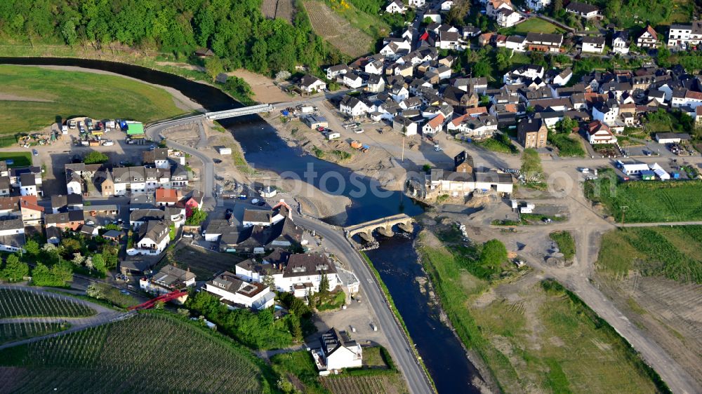Aerial image Rech - Destruction landscape on the river - bridge construction to cross the Ahr Nepomukbruecke on the Brueckenstrasse almost a year after the flood disaster in Rech im Ahrtal in the state Rhineland-Palatinate, Germany