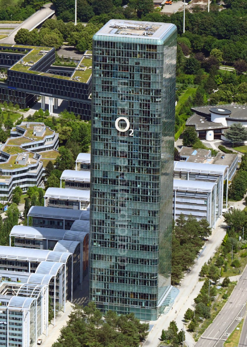 München from above - Uptown high-rise building - headquarters of Telefonica Germany (O2) and Astellas Pharma GmbH on Georg-Brauchle-Ring in the Moosach district of Munich in the state of Bavaria