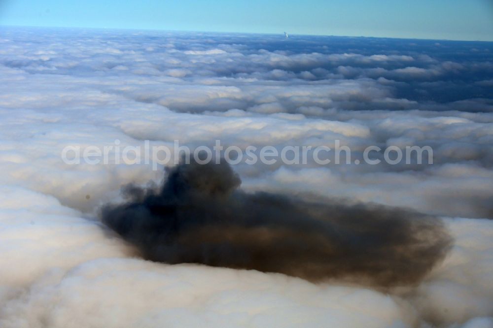 Riesa from above - Weather situation with cloud formation and black combustion residues in a closed covering layer of high fog over Riesa in the state Saxony, Germany