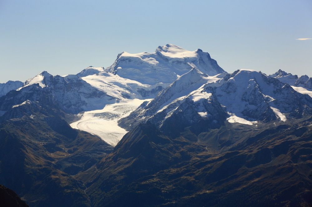 Bourg-Saint-Pierre from above - Rocky and mountainous landscape with summits of Grand Combin in the mountain massif the western Pennine Alps in the canton Wallis, Switzerland