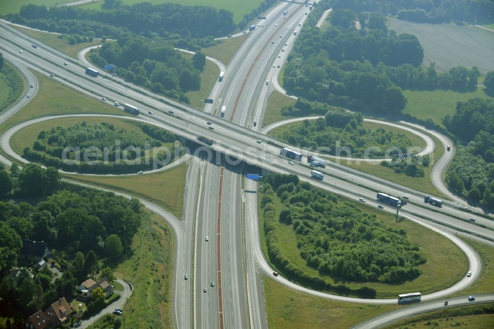 Bielefeld from above - Traffic flow at the intersection of the motorways A2 and A33 in Bielefeld in the state of North Rhine-Westphalia. The junction is located amongst fields and forest on the urban area in the South of Bielefeld