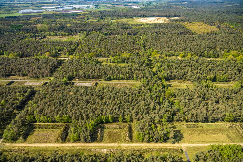 Aerial image Brüggen - Abandoned bunker building complex and ammunition depots in a forest area of the nature reserve NSG Brachter Wald in Brueggen in the federal state of North Rhine-Westphalia, Germany