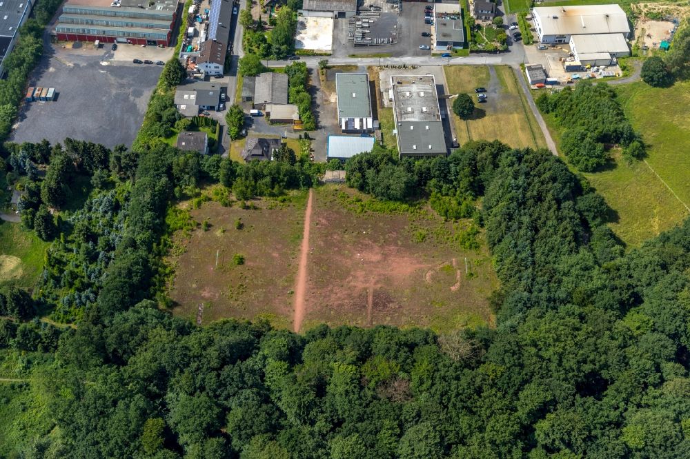 Aerial photograph Arnsberg - Abandoned sports field in the industrial and commercial area along the Weberstrasse in Arnsberg in the state North Rhine-Westphalia, Germany
