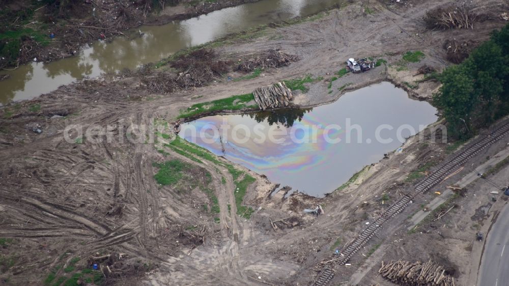 Aerial photograph Dernau - Course of the Ahr and oil-polluted fish pond after the flood disaster in the Ahr valley this year near Dernau in the state Rhineland-Palatinate, Germany